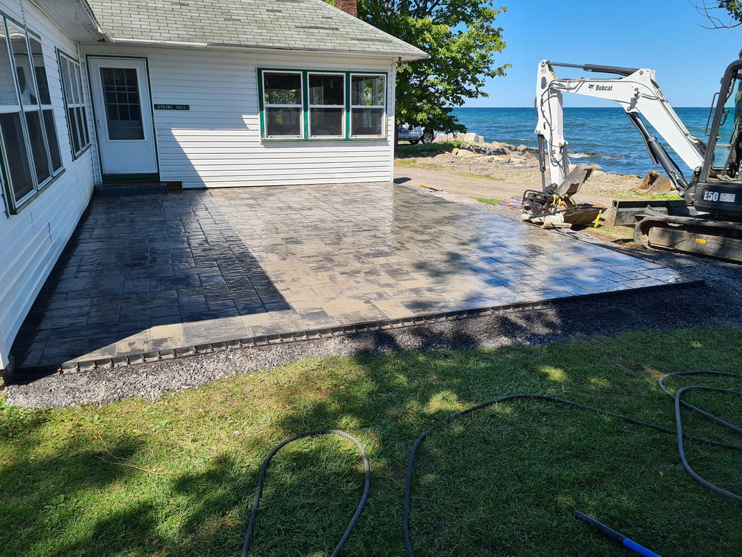 Lakefront paver patio landscaping project